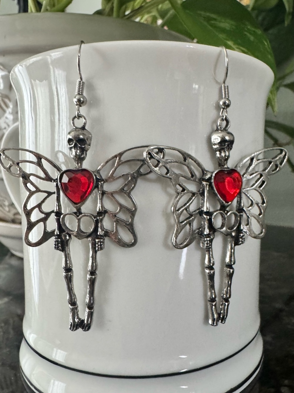 Silver Skeleton Fairy Earrings with Red Heart Gem 2” long